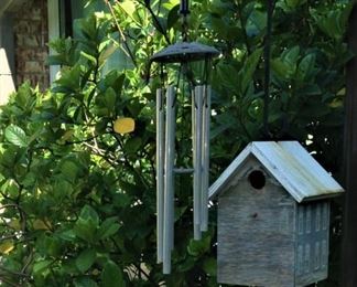 Wind chimes and bird house