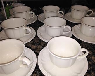 White stoneware cups and saucers
