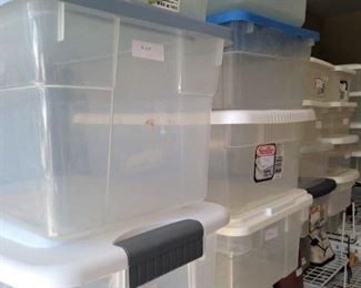 Lots of lidded plastic containers