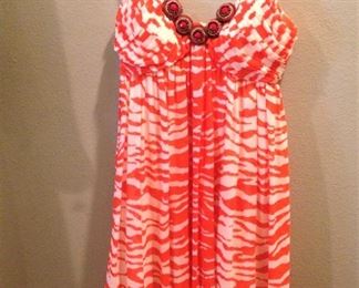 A darling orange and white dress