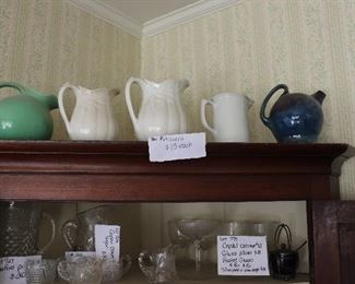 Pitchers for sale. $15 each  One on right is not signed