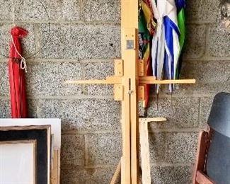 Umbrellas, 4 Folding Dark Wood Chairs w/Black Cushion Seats, $25 ea                                                                  
 Easel not for sale