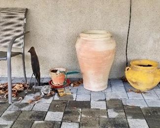 Metal Chair, mesh seat & Back, $40.00                                                              14" & 28" Terra Cotta Pots, $25.00, $45.00                  
Metal Bird/Garden Decor, $20