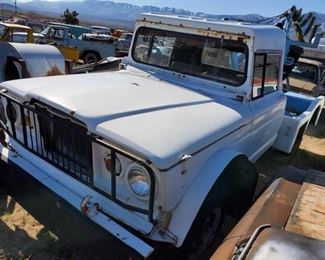 1004:	

1969 Kaiser Jeep M715 Tow Truck 4X4 1-1/4 Ton
VU, Has engine and trans