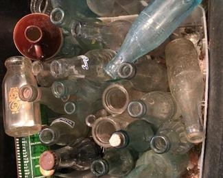 Lots of vintage bottles just uncovered. 