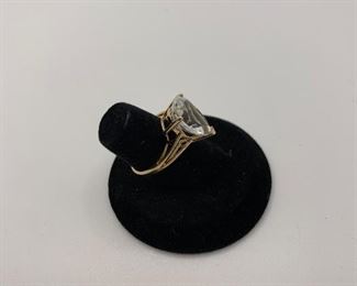 Size 6 14K 3.7g  TW While this is not a diamond, it is a beautiful large faceted pear shaped stone with a faint blue tint $450.00 #246