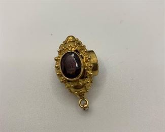  14K 10.3g TW Charm with 4 garnet colored stones  $350 #258