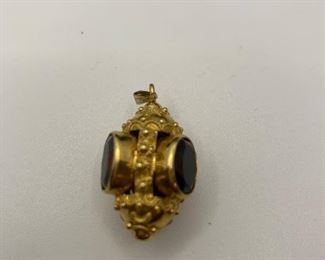  14K 10.3g TW Charm with 4 garnet colored stones  $350 #258