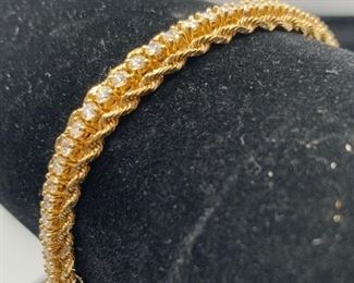 18k yellow gold diamond tennis bracelet  with gold rope edging 
 17.5 g TW 
4 carat total diamond weight 
GH color VS1 clarity
(Appraised at $8374) $3750 #300