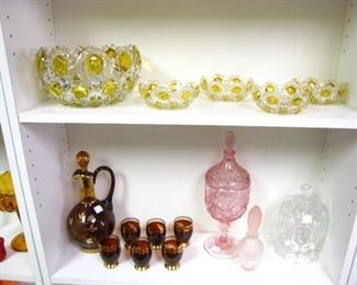 5 pc. Clear and Yellow Fruit/ Dessert set SOLD / Second shelf -  7pc Cordial  set $65 / Pink Footed cvd Candy dishSOLD / Pink Perfume Bottle $10 / glass Moon & stars cvd Jar (lid has chips base is good) $ 22                                  