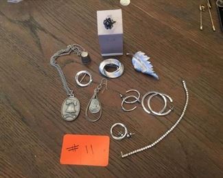 Sterling Lot: (11 pieces) pins, earrings, & thimble  $30