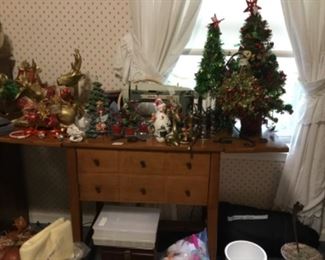 NewHome sewing machine in cabinet