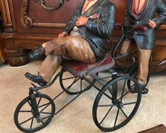 $ 350.00 -  Take 60% off - Laurel & Hardy on Bike - Large Fiberglass figures with metal / wood two seat bike  (21" x 19") Small hole/crack on back of Hardy's leg