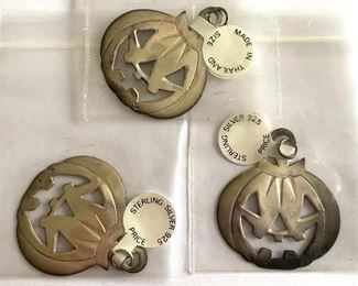 Sterling silver jack-o-lantern pendants $6 each
Shipping = $1
