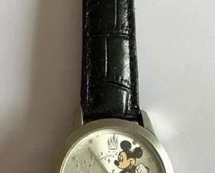 Mickey Through the Years watch (new battery, still had plastic protective cover on face) $15
Shipping = $2
