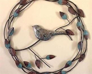Metal bird wall art 17” in diameter $12