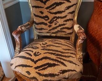 One of two Tiger print French Chairs 