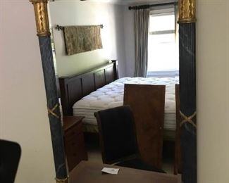 Mirror with Black and Gold Details