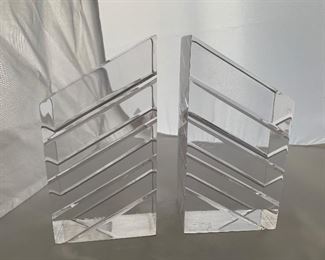 Lucite bookends.
Some surface scratches. 4”x 8”x3”
$40.00 pair 
