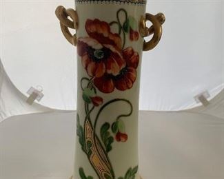 Beautiful antique porcelain vase with painted poppies. 10” tall
$85.00