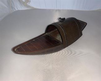 Antique copper or metal type Chinese look boat. 8” long Chinese writing on bottom. 
$70.00