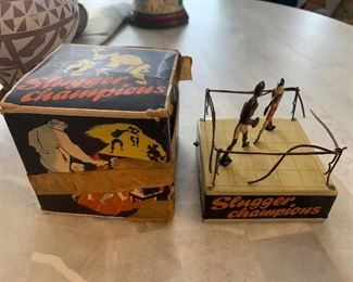 Antique tin boxing toy. Rubber band ropes are fragile and broke. Tin area in great shape for age. With box 
$50.00
