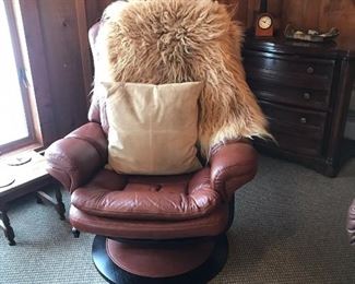 Set of two Lane brown leather chairs with ottomans
