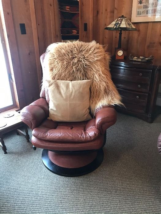 Set of two Lane brown leather chairs with ottomans