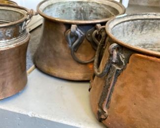 Assorted copper pots and cauldrons