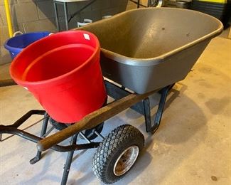 Wheelbarrow and spreader
