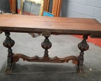 Antique Watertown Solid Wood Table with ornate carved base (drawer missing) Measures 5' W x 20"D x 30.25"H  closed open 5'W x 40"D x 30.25"H (Needs work) $295