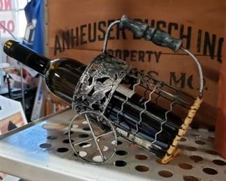 Pewter wine bottle holder on wheels with handle $15