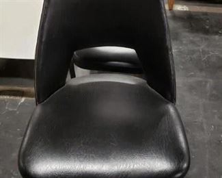 (1) Vintage MCM black vinyl padded swivel chair with studs $135