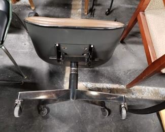 Vintage MCM brown vinyl arm chair on wheels (arms need to be refastened) $250