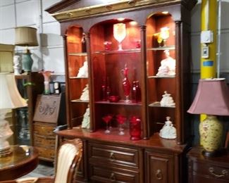 Gorgeous Lighted cherry 2 piece china cabinet & hutch with brass molding Measures: 63.25"W x 22"D x 95"H in center Was $995 Now $695