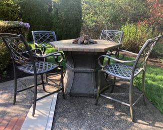 Fire pit table 3 ft tall, 4 ft-5” wide with 4 metal stools.
$550.
