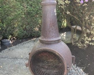 Iron outdoor chiminea 
51” tall and 21” wide.
$260