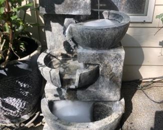 Plastic resin fountain 
34” tall, base is 15” x 15”
$95