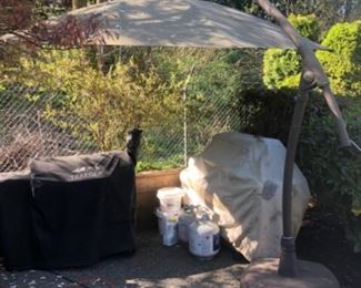 Cantilever patio umbrella 
8 ft across
$195.
