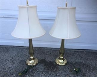 Pair of heavy brass lamps one has spots on the base may be cleanable. $28.00 