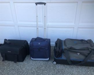 3 pc. Ful bold drop bottom wheeled rolling duffel bag, Crosby carry-on luggage Narrow profile, and black square case. $ 120.00 