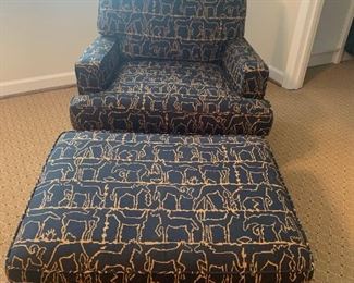 Custom black and gold upholstered lounge chair and ottoman, $450
