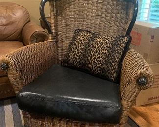 Rattan lounge chair, leather seat, $150