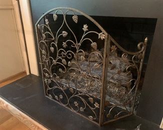 Fireplace screen with candleholders, $65