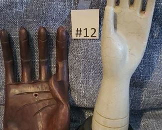 #12 Wooden hands Brown is wall hanger both good for jewelry hanger or more. Hand 8x4.5  Arm 12x3 $12 Tas-Estate-Sales to purchase