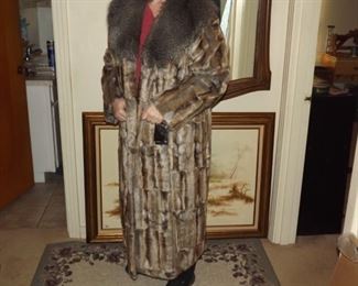 Full lenght coat with collar. Tags still on it.  $150.00