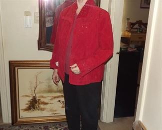 red suede short jacket with rhinestones on front. $75