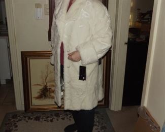 beautiful white faux fur new with tags. XL.  $100.00