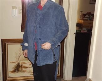 suede jacket with ruffle around sleeves and neck. $100