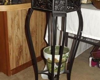 Plant stand. Marble top and heavy iron legs. $65.00